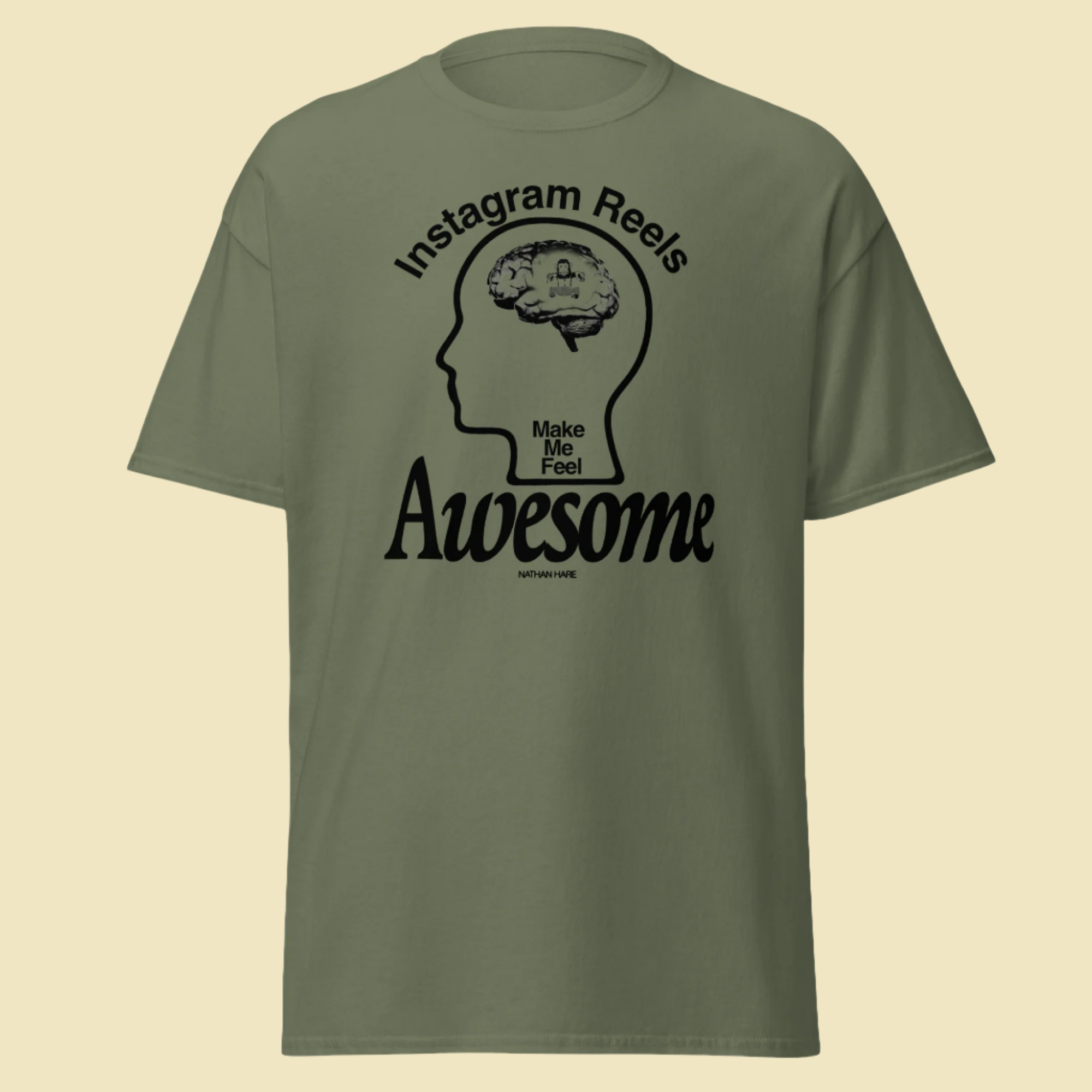 A mockup of Nathan Hare creator merch, short sleeve t-shirt in olive green that says "Instagram Reels Make Me Feel Awesome" 