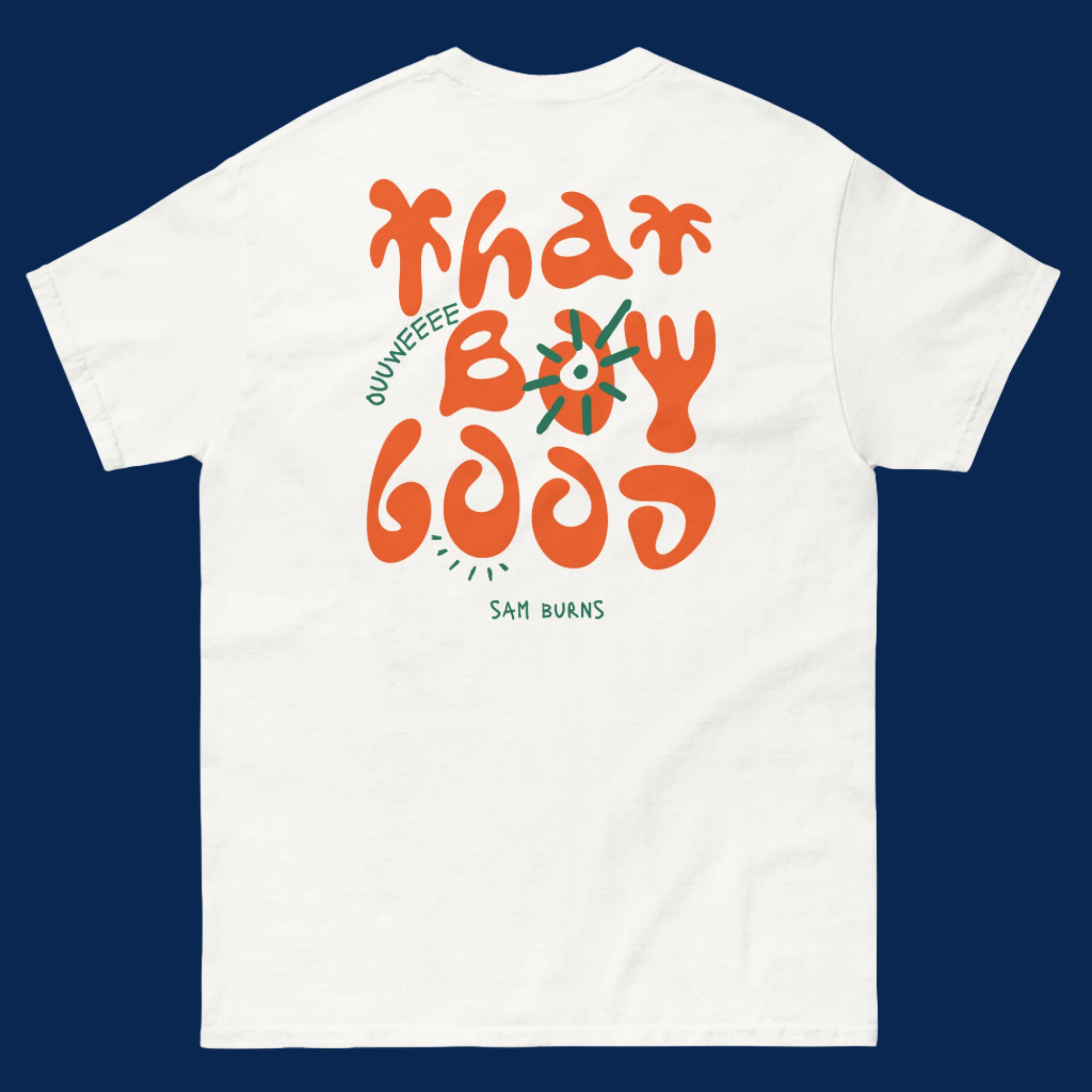 Custom comedy creator merch t-shirts by Sam Burns featuring "That Boy Good" in retro orange typography - premium comedian apparel for fan engagement and brand building